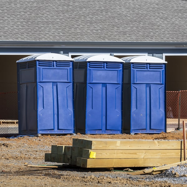 what is the cost difference between standard and deluxe portable restroom rentals in Medina